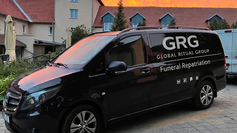 GRG funeral repatriation van at sunset